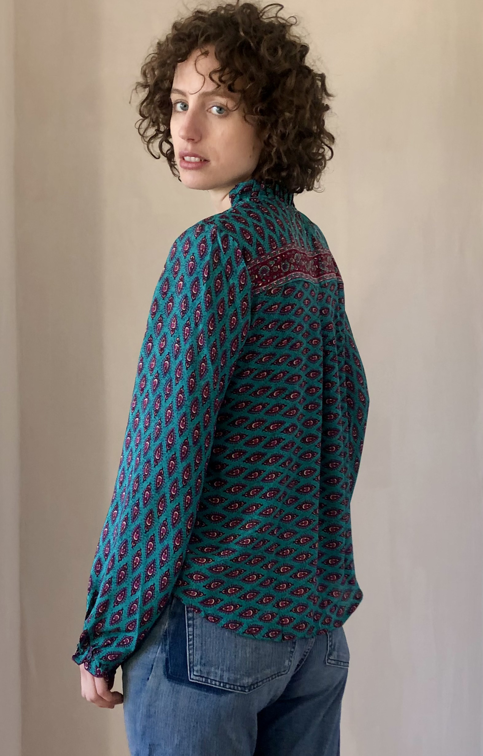 Ruffle neck Blouse in Turquoise bindi - back